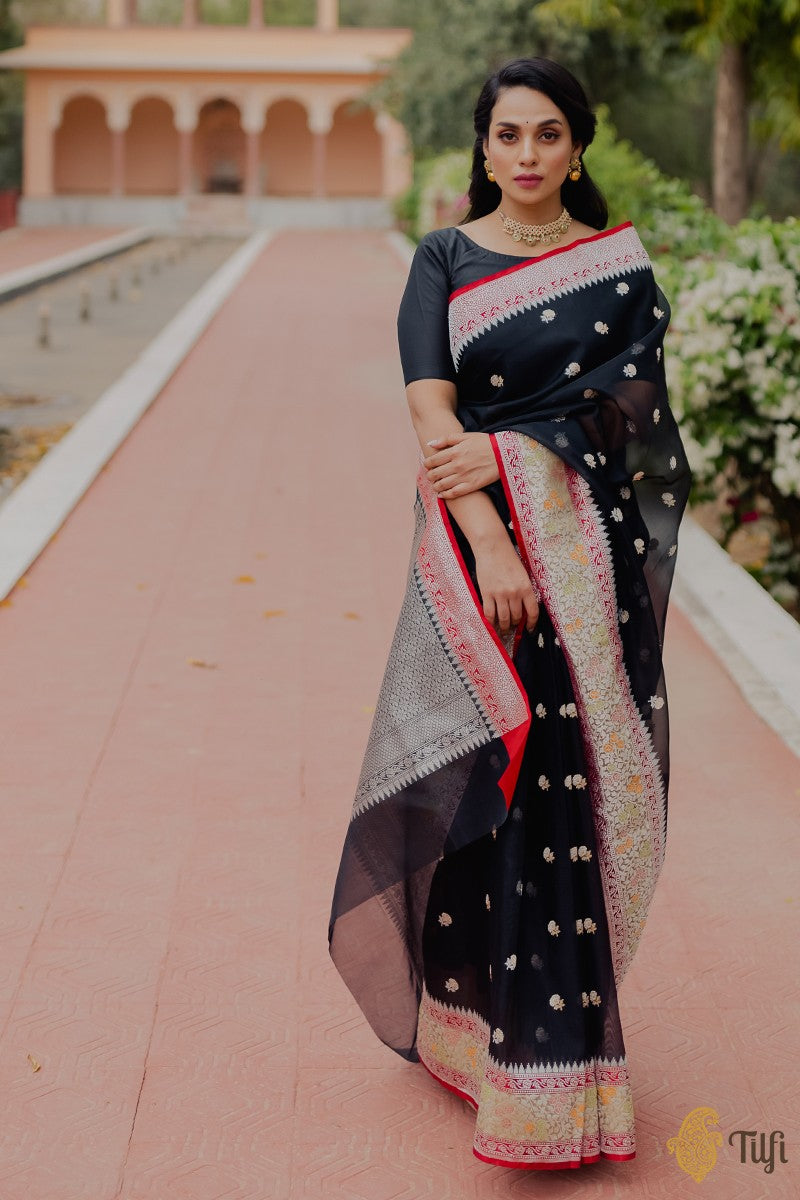 Ramya Nambessan's traditional look in a black mirror work saree!
