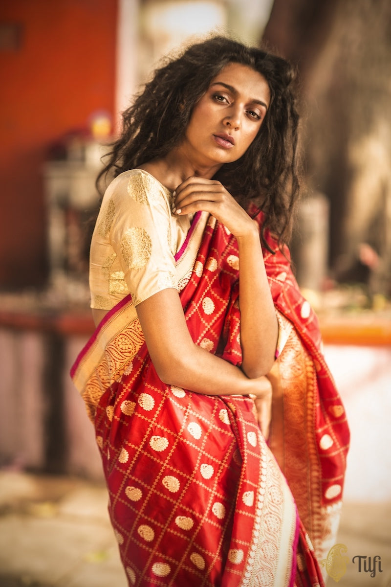 Buy Charming Orange and Red Zari Woven Traditional Saree Online -Inddus.in.